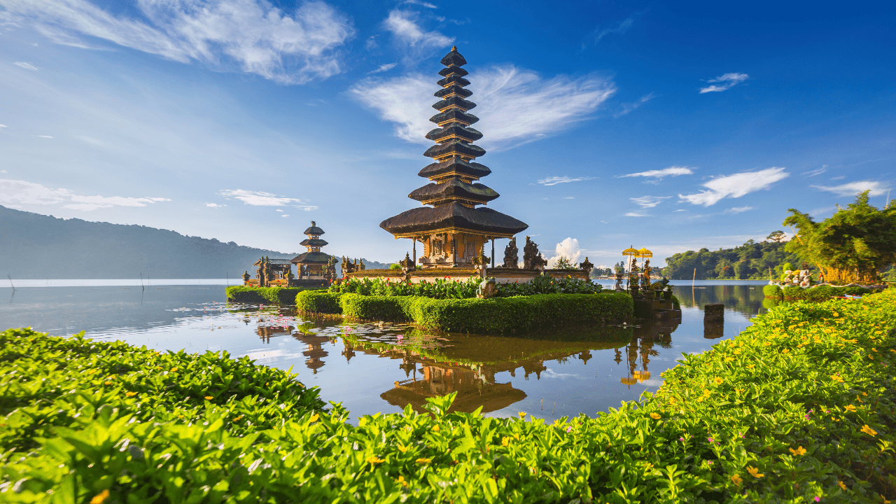 Ulun Danu Beratan Temple in Bali, floating on Lake Beratan with mountains in the background